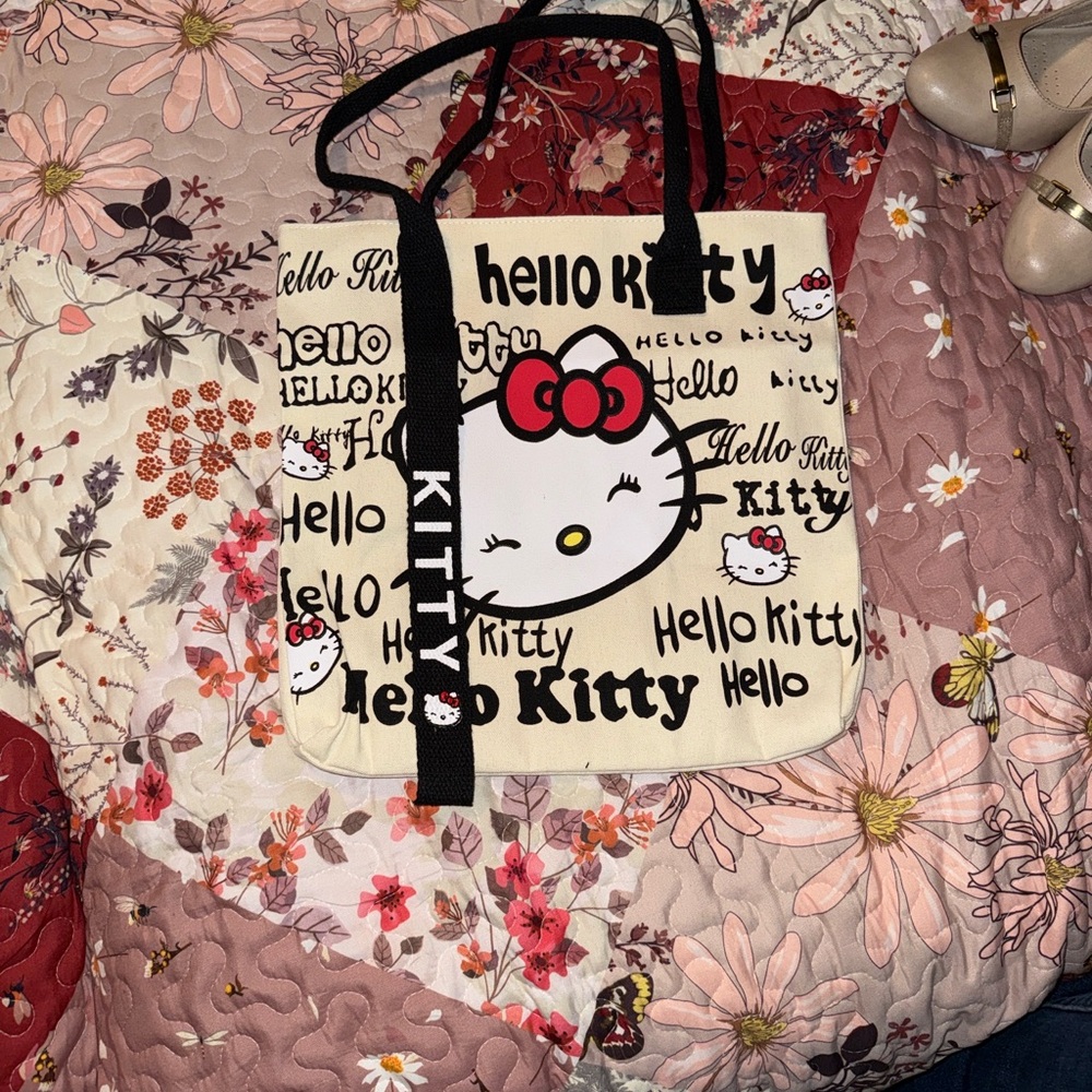 ⭐ 5 for $30 Mix & Match Items.. 
Hello Kitty Cream and Black Tote with Red Bow
